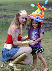 rainbow balloon hat and wonder woman